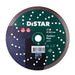 A Distar branded diamond cutting blade, with a green label indicating it is a 'Gabbro Max' model, 230 mm in diameter, with a turbo design for cutting granite.