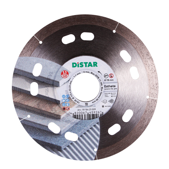Diamond cutting blade with the brand name DISTAR, designed for cutting ceramic materials. The blade has a silver color, with a combination of solid and transparent areas, and features the text 'ESTHETE' on the label.