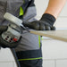 Tiler cutting porcelain tile at 45 degree bevel with DISTAR Edge Dry diamond blade