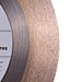 Close-up of DISTAR Edge blade showing sandwich diamond layer design