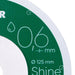 Close-up of a green and white circular object with text and measurements.