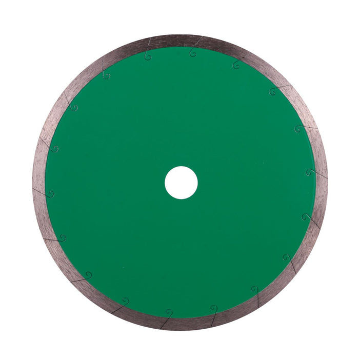 Green circular saw blade with a white center on a white background
