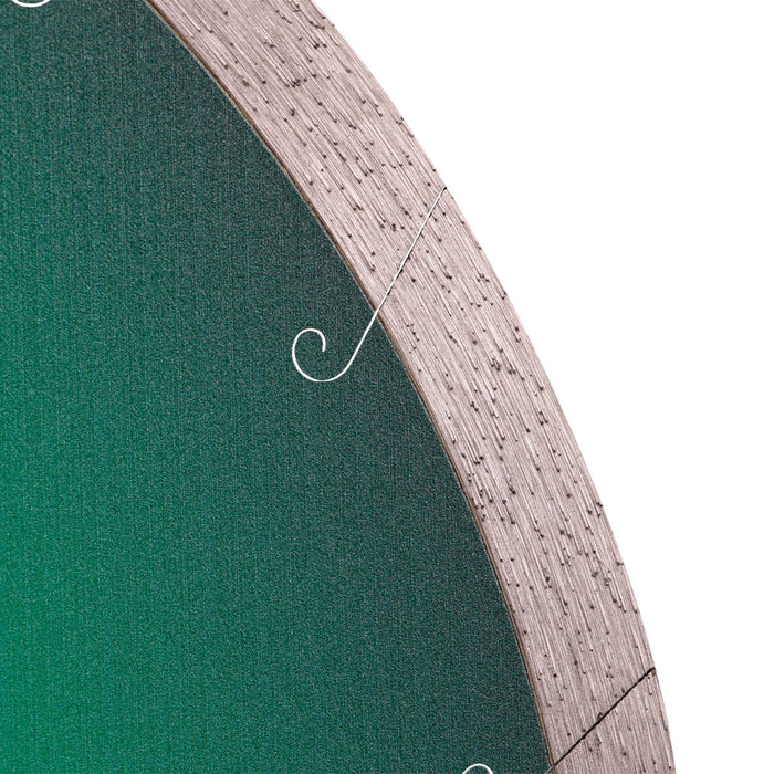 Close-up of a circular object with a textured edge and green center.