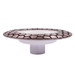 Decorative cake stand with patterned top and white base on a white background
