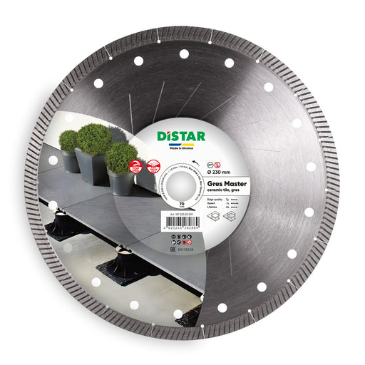 A diamond blade with the brand name Distar, designed for cutting gres tiles, showcasing the blade's surface with diamond segments and the product packaging with an image of a terrace.