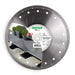 A diamond blade with the brand name Distar, designed for cutting gres tiles, showcasing the blade's surface with diamond segments and the product packaging with an image of a terrace.