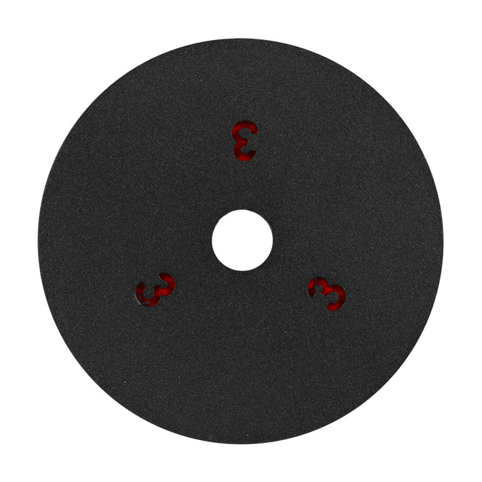 Black circular pad with a central white hole and red number '3' printed on it, on a white background.