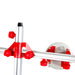 Mechanical device with red and silver components on a white background