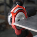 Circular saw cutting a piece of wood with a blurred background