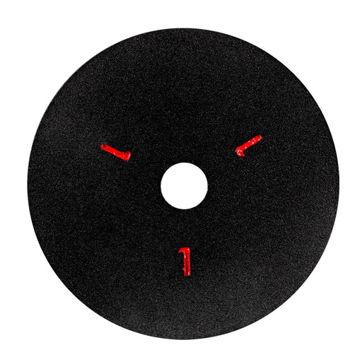 A black fixing plate with red markings for mounting on an angle grinder.