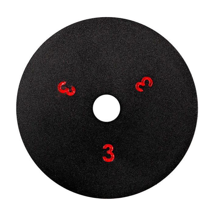 Black polishing pad with red numbers on a white background