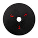 Black polishing pad with red numbers on a white background