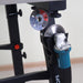 Angle grinder with circular saw blade attachment on a stand